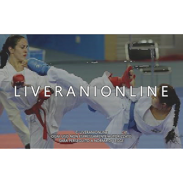 (101126) -- GUANGZHOU, Nov. 26, 2010 () -- Uzbekistan\'s Barno Mirzaeva (R) competes against Palestine\'s Zuhriia Mshenesh during the women\'s -61kg bronze medal match of Karate at the 16th Asian Games in Guangzhou, south China\'s Guangdong Province, Nov. 26, 2010. Barno Mirzaeva won 2-0 and got the bronze medal of the category. (/Gesang Dawa) - Xinhua/Photoshot - Ag. Aldo Liverani sas ITALY ONLY CINA - 16mi GIOCHI OLIMPICI ASIATICI: KARATE