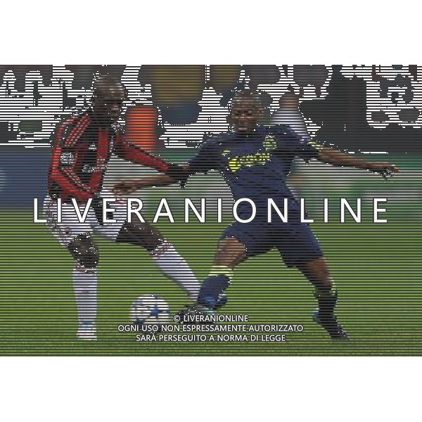 UEFA Champions League 2010/2011 Gruppo G Milano - 08.12.2010 Milan-Ajax Nella Foto:seedorf-enoh /Ph.Vitez-Ag. Aldo Liverani