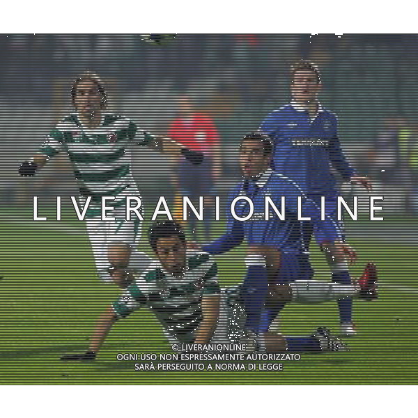 UEFA Champions League group C soccer match between Bursaspor Turkey and Rangers FC at Ataturk Stadium in Bursa, Turkey 07.12..2010 Match Scored : Bursaspor 1 - Rangers FC 1 Pictured: Federico Insua ( up L) and Ozan Ipek (Below L) of Bursasport and Steven Davis (up R) and Darren Cole ( below R) of Rangers FC. AG. ALDO LIVERANI SAS ITALY ONLY