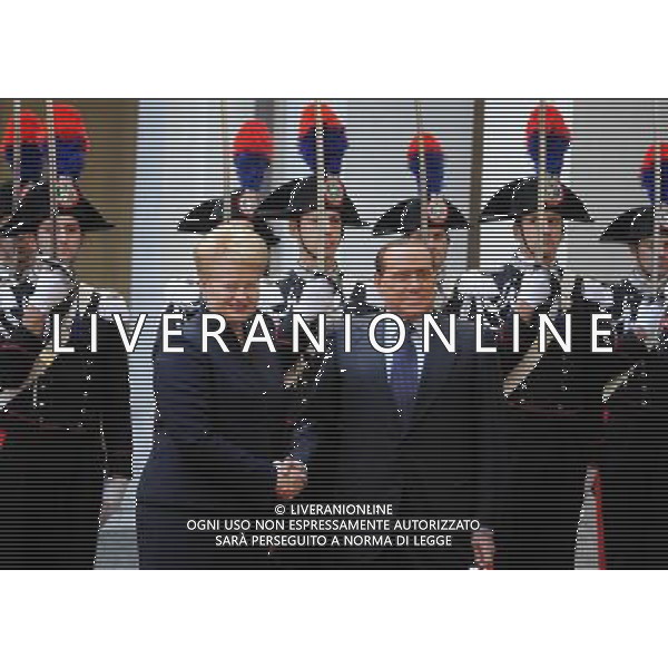 (101210) -- ROME, Dec. 10, 2010 () -- Italian Prime Minister Silvio Berlusconi(R) welcomes visiting Lithuanian President Dalia Grybauskaite before their meeting in Rome, Italy, Dec. 10, 2010. (/Wang Qingqin) (yc) AG ALDO LIVERANI ONLY ITALY