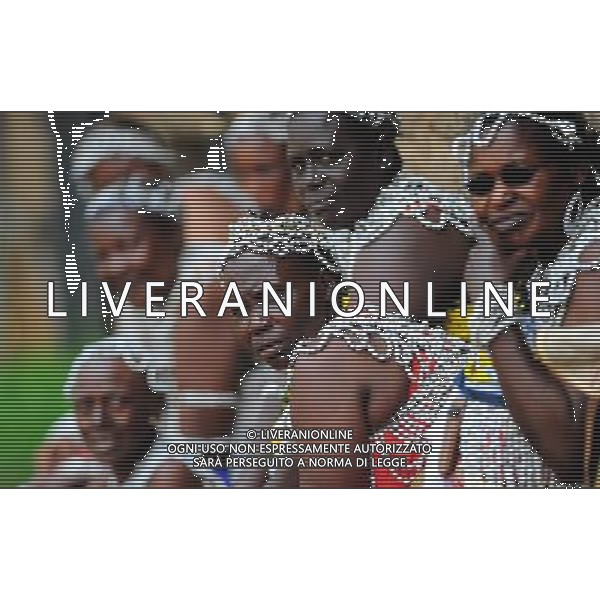 (101209) -- NAIROBI, Dec. 9, 2010 () -- Women from an aboriginal tribe in Coast Province of Kenya wear headgears made of shells on Dec. 7, 2010. 42 aboriginal tribes in Kenya share the cultural diversity with their different kinds of headgears made of fur, feather and shells. (/Zhao Yingquan)(djj) - Xinhua/Photoshot - Ag. Aldo Liverani sas ITALY ONLY NAIROBI - VARI COPRICAPO DELLE TRIBU\' DEL KENYA