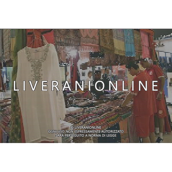 20101211: ABU DHABI, UNITED ARAB EMIRATES - Internacional Porto Alegre players shopping at a mall in Abu Dhabi, a few days before their debut on the FIFA Club World Cup 2010. In picture: Giuliano and Derley. PHOTO: CITYFILES/NEWSPIX.PL ZJEDNOCZONE EMIRATY ARABSKIE KLUBOWE MISTRZOSTWA SWIATA PILKA NOZNA PORTUGAL,BRAZIL,SPAIN,GERMANY,FRANCE,UK OUT !!! --- Newspix.pl /Agenzia Aldo Liverani Sas - ITALY ONLY - I giocatori dell\' International Porto Alegre ad ABU DHABI, negli Emirati Arabi Uniti per partecipare al FIFA World Cup 2010, Mondiale per Club, Coppa Intercontinentale 13/12/2010 *** Local Caption *** www.newspix.pl mail us: info@newspix.pl call us: 0048 022 23 22 222 --- Polish Picture Agency by Ringier Axel Springer Poland