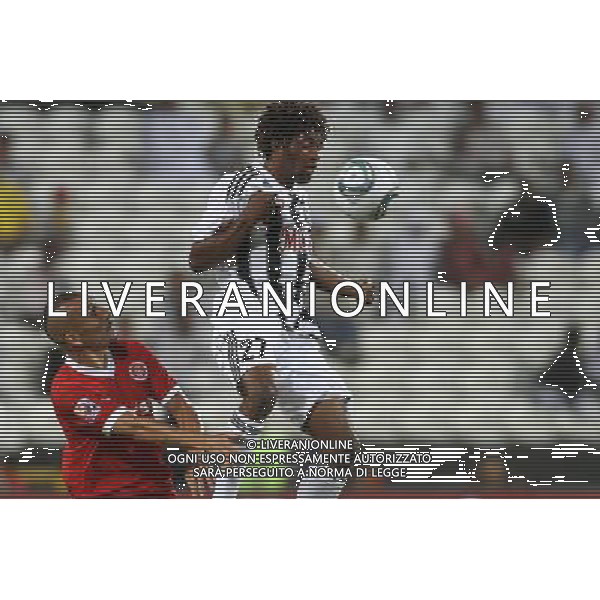 ABU DHABI, EMIRATI ARABI UNITI 14/12/2010 - MAZEMBE vs Internacional Porto Alegre: FIFA Club World Cup, MONDIALE PER CLUB , COPPA INTERCONTINENTALE In picture: Guinazu (Internacional) and Kasongo (Mazembe). ©CITYFILES/NEWSPIX.PL/AGENZIA ALDO LIVERANI SAS - ONLY ITALY PORTUGAL,BRAZIL,SPAIN,GERMANY,FRANCE,UK OUT !!! *** Local Caption *** www.newspix.pl mail us: info@newspix.pl call us: 0048 022 23 22 222 --- Polish Picture Agency by Ringier Axel Springer Polandwww.newspix.pl mail us: info@newspix.pl call us: 0048 022 23 22 222 --- Polish Picture Agency by Ringier Axel Springer Polandwww.newspix.pl mail us: info@newspix.pl call us: 0048 022 23 22 222 --- Polish Picture Agency by Ringier Axel Springer Polandwww.newspix.pl mail us: info@newspix.pl call us: 0048 022 23 22 222 --- Polish Picture Agency by Ringier Axel Springer Polandwww.newspix.pl mail us: info@newspix.pl call us: 0048 022 23 22 222 --- Polish Picture Agency by Ringier Axel Springer Poland