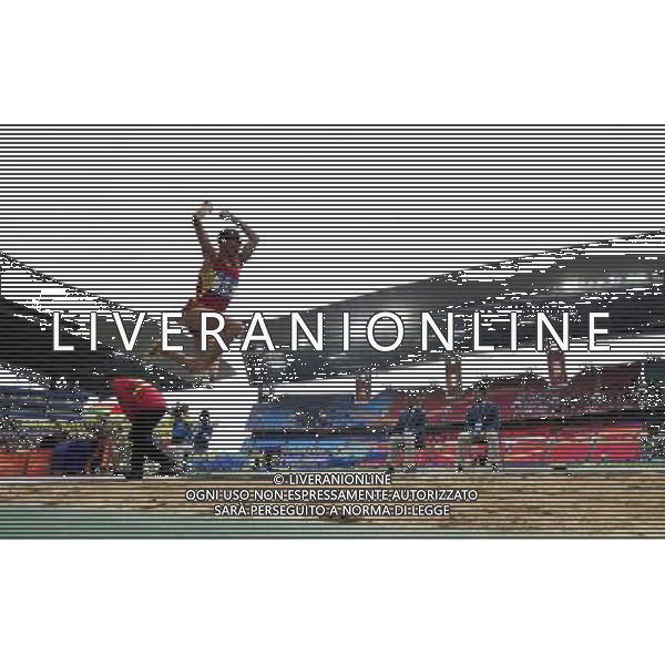 (101214) -- GUANGZHOU, Dec. 14, 2010 () -- China\'s Li Duan competes during the men\'s long jump F11 final match at the Guangzhou 2010 Asian Para Games in Guangzhou, south China\'s Guangdong Province, Dec. 14, 2010. Li won the gold medal of the event with 5.96 meters. (/Chen Yehua) (xm) AG. ALDO LIVERANI SAS ITALY ONLY