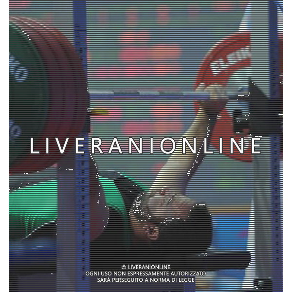 (101214) -- GUANGZHOU, Dec. 14, 2010 () -- Hamzeh Mohammadi of Iran competes during the men\'s 60kg final of powerlifting competition at the Guangzhou 2010 Asian Para Games in Guangzhou, south China\'s Guangdong Province, Dec. 14, 2010. Hamzeh Mohammadi won the gold with 197.5 kg. (/Fan Changguo) AG. ALDO LIVERANI SAS ITALY ONLY