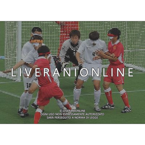 (101214) -- GUANGZHOU, Dec. 14, 2010 () -- Wang Yafeng (4th R) of China shoots during the preliminary match of the men\'s football 5-a-side competition against South Korea at the Guangzhou 2010 Asian Para Games in Guangzhou, south China\'s Guangdong Province, Dec. 14, 2010. China won 4-0. (/Wang Song) AG. ALDO LIVERANI SAS ITALY ONLY