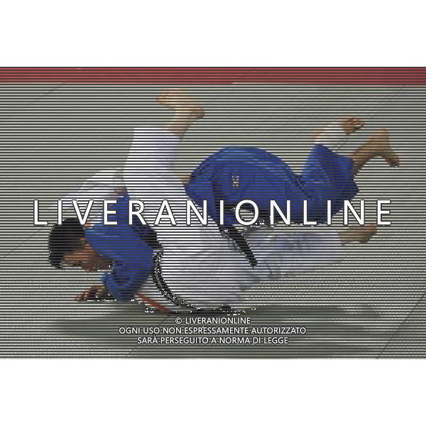 (101214) -- GUANGZHOU, Dec. 14, 2010 () -- Gold medalist Li Xiaodong (above) of China competes during the men\'s 60kg Judo competition at the Guangzhou 2010 Asian Para Games in Guangzhou, south China\'s Guangdong Province, Dec. 14, 2010. (/Han Chuanhao) AG. ALDO LIVERANI SAS ITALY ONLY