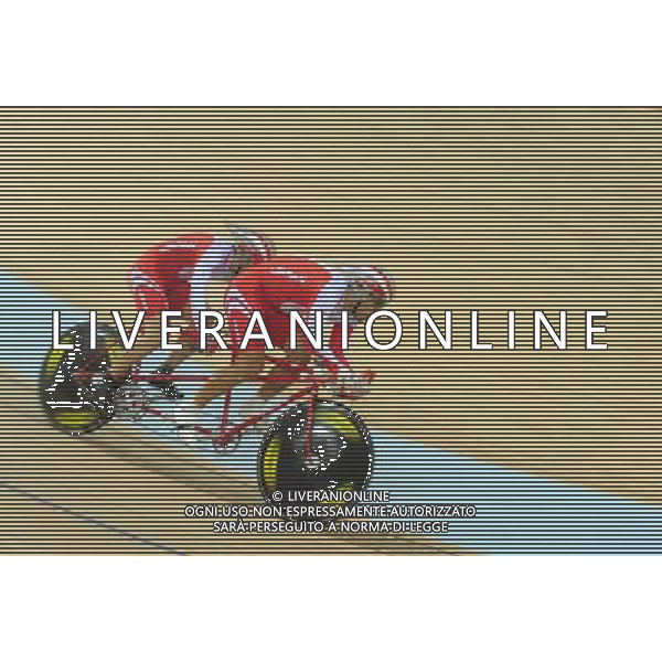 (101214) -- GUANGZHOU, Dec. 14, 2010 () -- Tatsuyuki Oshiro and Yasufumi Ito of Japan compete during the mixed tandem 1km time trial final of cycling track competition at the Guangzhou 2010 Asian Para Games in Guangzhou, south China\'s Guangdong Province, Dec. 14, 2010. Tatsuyuki Oshiro and Yasufumi Ito won the gold with 1 minute and 6.473 seconds. (/Lu Hanxin) AG. ALDO LIVERANI SAS ITALY ONLY