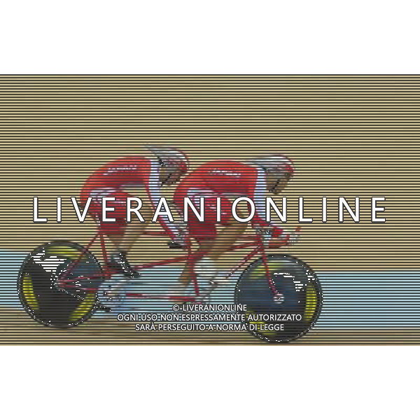 (101214) -- GUANGZHOU, Dec. 14, 2010 () -- Tatsuyuki Oshiro and Yasufumi Ito of Japan compete during the mixed tandem 1km time trial final of cycling track competition at the Guangzhou 2010 Asian Para Games in Guangzhou, south China\'s Guangdong Province, Dec. 14, 2010. Tatsuyuki Oshiro and Yasufumi Ito won the gold with 1 minute and 6.473 seconds. (/Lu Hanxin) AG. ALDO LIVERANI SAS ITALY ONLY