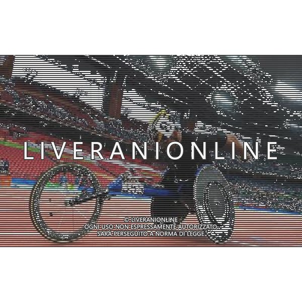 (101214) -- GUANGZHOU, Dec. 14, 2010 () -- South Korea\'s Hong Sukman competes during the men\'s 800m T53 final of athletics competition at the Guangzhou 2010 Asian Para Games in Guangzhou, south China\'s Guangdong Province, Dec. 14, 2010. Hong Sukman won the gold with 1 minute and 42.16 seconds. (/Ren Junchuan) AG. ALDO LIVERANI SAS ITALY ONLY