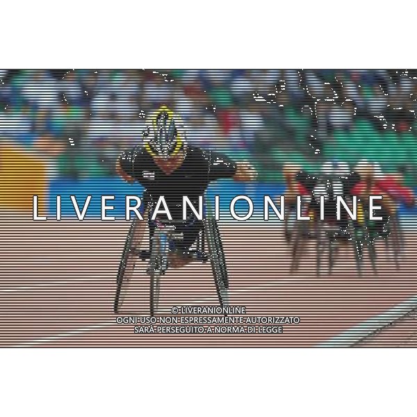 (101214) -- GUANGZHOU, Dec. 14, 2010 () -- South Korea\'s Hong Sukman competes during the men\'s 800m T53 final of athletics competition at the Guangzhou 2010 Asian Para Games in Guangzhou, south China\'s Guangdong Province, Dec. 14, 2010. Hong Sukman won the gold with 1 minute and 42.16 seconds. (/Ren Junchuan) AG. ALDO LIVERANI SAS ITALY ONLY