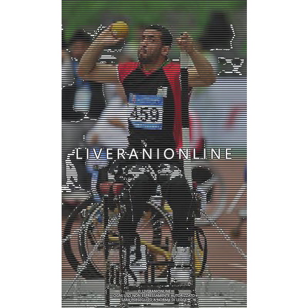 (101214) -- GUANGZHOU, Dec. 14, 2010 () -- Fadi J.s Aldeeb of Palestine competes during the men\'s shot put F54/55/56 final of athletics competition at the Guangzhou 2010 Asian Para Games in Guangzhou, south China\'s Guangdong Province, Dec. 14, 2010. Fadi J.s Aldeeb took the 5th with 8.84 meters. (/Chen Yehua) AG. ALDO LIVERANI SAS ITALY ONLY