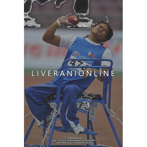 (101214) -- GUANGZHOU, Dec. 14, 2010 () -- Jerico Openia of the Philippines competes during the men\'s shot put F54/55/56 final of athletics competition at the Guangzhou 2010 Asian Para Games in Guangzhou, south China\'s Guangdong Province, Dec. 14, 2010. Jerico Openia took the 9th with 8.10 meters. (/Chen Yehua) AG. ALDO LIVERANI SAS ITALY ONLY