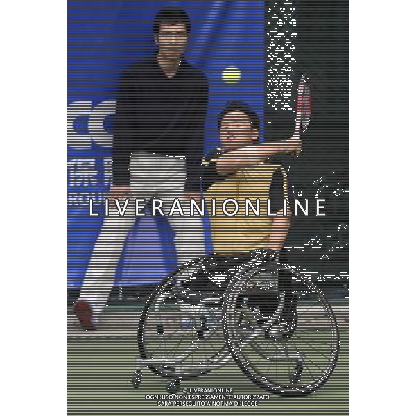 (101214) -- GUANGZHOU, Dec. 14, 2010 () -- South Korea\'s Lee Ha Gel competes during the 2nd round of the men\'s singles open of wheelchair tennis competition against China\'s Feng Xiaomin at the Guangzhou 2010 Asian Para Games in Guangzhou, south China\'s Guangdong Province, Dec. 14, 2010. Lee Ha Gel won 2-0 to enter the next round. (/Yue Yuewei) AG. ALDO LIVERANI SAS ITALY ONLY