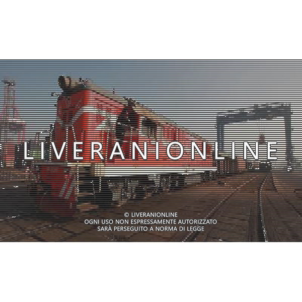 (101201) -- LIANYUNGANG, Dec. 1, 2010 () -- A cargo train sets out from Lianyungang Port in Liangyungang, east China\'s Jiangsu Province, Dec. 1, 2010. It is the 18th anniversary of the launching of the second Asia-Europe Land Bridge Wednesday. The Land Bridge, put into operation in 1992, is the most economical and fastest Asia-Europe land rail route at present. The 10,870-km route starts from east China\'s coastal city of Lianyungang, and finishes at Netherland\'s Rotterdam. (/Wang Jianmin) (wxy) AG. ALDO LIVERANI SAS ITALY ONLY