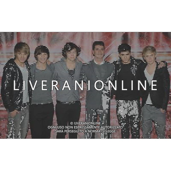  - Picture Shows: Simon Cowell and One Direction attending a photo call with the X-Factor finalists. Held at the Connaught Hotel, Mayfair, London, on Thursday December 08, 2010. - - ©PHOTOHOT/Agenzia Aldo Liverani Sas - ITALY ONLY - EDITORIAL USE ONLY -