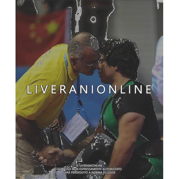 (101215) -- GUANGZHOU, Dec. 15, 2010 () -- Majid Farzin (R) of Iran is congratulated by his coach after the men\'s powerlifting 75kg at the Guangzhou 2010 Asian Para Games in Guangzhou, south China\'s Guangdong Province, Dec. 15, 2010. (/Fan Changguo) AG. ALDO LIVERANI SAS ITALY ONLY