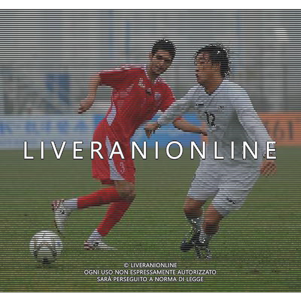 (101215) -- GUANGZHOU, Dec. 15, 2010 () -- Oh Hyeon Seok (R) of South Korea defends during the men\'s football 7-a-side first round match against Iran at the Guangzhou 2010 Asian Para Games in Guangzhou, south China\'s Guangdong Province, Dec. 15, 2010. (/Han Chunhao) AG. ALDO LIVERANI SAS ITALY ONLY