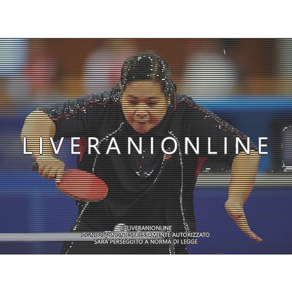(101215) -- GUANGZHOU, Dec. 15, 2010 () -- Josephine Medina of the Philippines competes during the women\'s singles TT6-8 of table tennis competition against China\'s Mao Jingdian at the Guangzhou 2010 Asian Para Games in Guangzhou, south China\'s Guangdong Province, Dec. 15, 2010. Josephine Medina lost 0-3 to win the silver. (/Xu Yu) AG. ALDO LIVERANI SAS ITALY ONLY