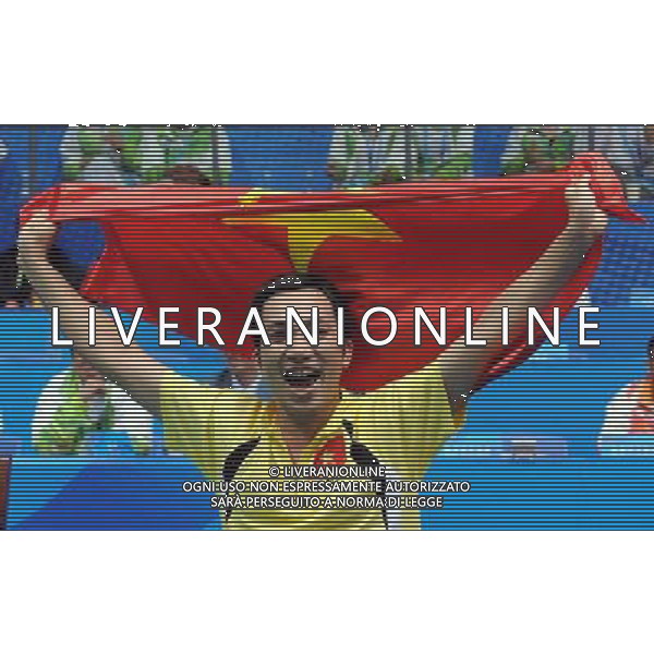 (101215) -- GUANGZHOU, Dec. 15, 2010 () -- Vietnam\'s Hoang Pham Thang celebrates after winning the men\'s singles BMSTL1 final of badminton competition against China\'s Tian Shiwei at the Guangzhou 2010 Asian Para Games in Guangzhou, south China\'s Guangdong Province, Dec. 15, 2010. Hoang Pham Thang won 2-0 to claim the champion. (/Wang Song) AG. ALDO LIVERANI SAS ITALY ONLY