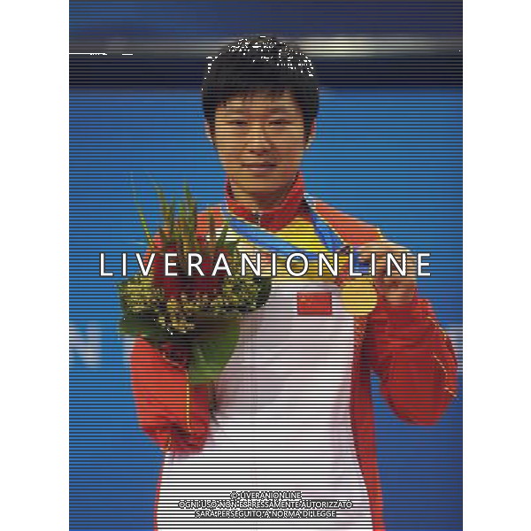 (101215) -- GUANGZHOU, Dec. 15, 2010 () -- Gold medalist China\'s Ge Yang shows his medal during the awarding ceremony of the men\'s singles TT10 of table tennis competition at the Guangzhou 2010 Asian Para Games in Guangzhou, south China\'s Guangdong Province, Dec. 15, 2010. (/Xu Yu) AG. ALDO LIVERANI SAS ITALY ONLY