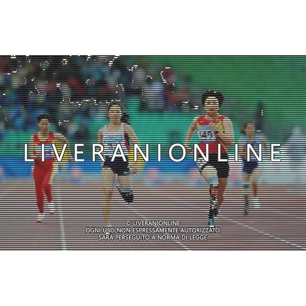 (101215) -- GUANGZHOU, Dec. 15, 2010 () -- China\'s Wang Juan (R front) competes during the women\'s 100m T44 final of athletics competition at the Guangzhou 2010 Asian Para Games in Guangzhou, south China\'s Guangdong Province, Dec. 15, 2010. Wang Juan won the gold with 14.03 seconds. (/Ren Junchuan) AG. ALDO LIVERANI SAS ITALY ONLY
