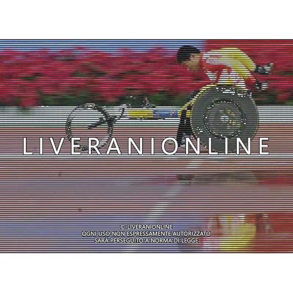 (101215) -- GUANGZHOU, Dec. 15, 2010 () -- China\'s Cui Yanfeng competes during the men\'s 400m T54 semifinal of athletics competition at the Guangzhou 2010 Asian Para Games in Guangzhou, south China\'s Guangdong Province, Dec. 15, 2010. Cui Yanfeng entered the final with 54.76 seconds. (/Chen Yehua) AG. ALDO LIVERANI SAS ITALY ONLY