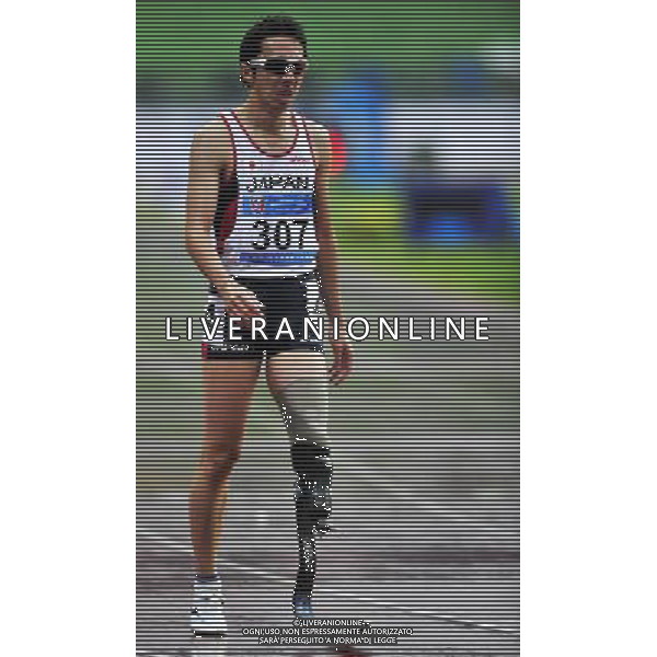 (101215) -- GUANGZHOU, Dec. 15, 2010 () -- Japan\'s Jun Haruta reacts after the men\'s 400m T44 semifinal of athletics competition at the Guangzhou 2010 Asian Para Games in Guangzhou, south China\'s Guangdong Province, Dec. 15, 2010. Jun Haruta entered the final with 1 minute 3.87 seconds. (/Chen Yehua) AG. ALDO LIVERANI SAS ITALY ONLY