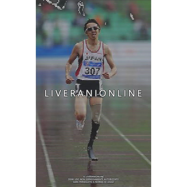 (101215) -- GUANGZHOU, Dec. 15, 2010 () -- Japan\'s Jun Haruta competes during the men\'s 400m T44 semifinal of athletics competition at the Guangzhou 2010 Asian Para Games in Guangzhou, south China\'s Guangdong Province, Dec. 15, 2010. Jun Haruta entered the final with 1 minute 3.87 seconds. (/Chen Yehua) AG. ALDO LIVERANI SAS ITALY ONLY