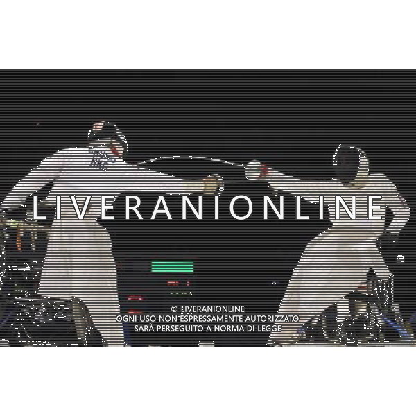 (101215) -- GUANGZHOU, Dec. 15, 2010 () -- Iraq\'s Amar Ali (R) competes during the men\'s individual epee category B final of wheelchair fencing competition against Chinese Hong Kong\'s Chung TC at the Guangzhou 2010 Asian Para Games in Guangzhou, south China\'s Guangdong Province, Dec. 15, 2010. Amar Ali won 15-13 to claim the champion. (/Liang Xu) AG. ALDO LIVERANI SAS ITALY ONLY
