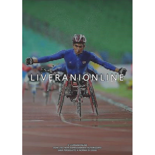 (101215) -- GUANGZHOU, Dec. 15, 2010 () -- Thailand\'s Prawat Wahoram reacts after winning the men\'s 5000m T54 final of athletics competition at the Guangzhou 2010 Asian Para Games in Guangzhou, south China\'s Guangdong Province, Dec. 15, 2010. Prawat Wahoram won the gold with 12 minutes and 6.29 seconds. (/Ren Junchuan) AG. ALDO LIVERANI SAS ITALY ONLY