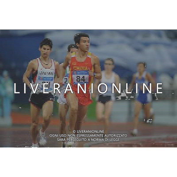 (101215) -- GUANGZHOU, Dec. 15, 2010 () -- China\'s Qi Shun (front R) and Japan\'s Tadashi Horikoshi (front L)compete during the men\'s 5000m T12 final of athletics competition at the Guangzhou 2010 Asian Para Games in Guangzhou, south China\'s Guangdong Province, Dec. 15, 2010. Qi Shun won the gold with 15 minutes and 54.01 seconds. Tadashi Horikoshi won the silver with 15 minutes and 59.75 seconds. (/Ren Junchuan) AG. ALDO LIVERANI SAS ITALY ONLY