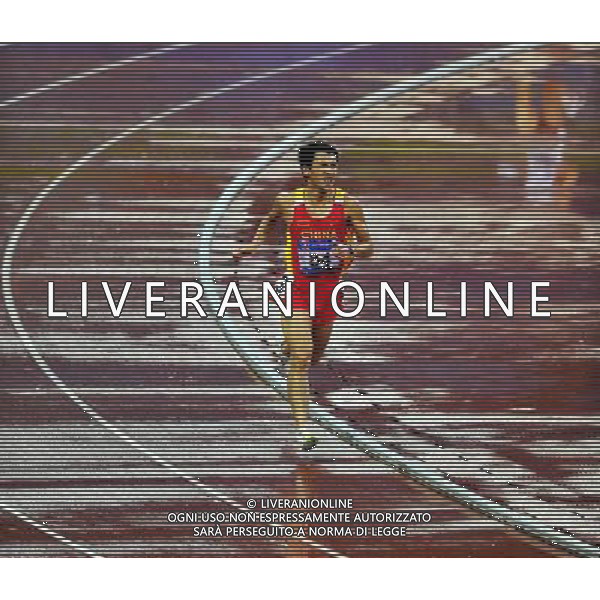 (101215) -- GUANGZHOU, Dec. 15, 2010 () -- China\'s Qi Shun competes during the men\'s 5000m T12 final of athletics competition at the Guangzhou 2010 Asian Para Games in Guangzhou, south China\'s Guangdong Province, Dec. 15, 2010. Qi Shun won the gold with 15 minutes and 54.01 seconds. (/Chen Yehua) AG. ALDO LIVERANI SAS ITALY ONLY