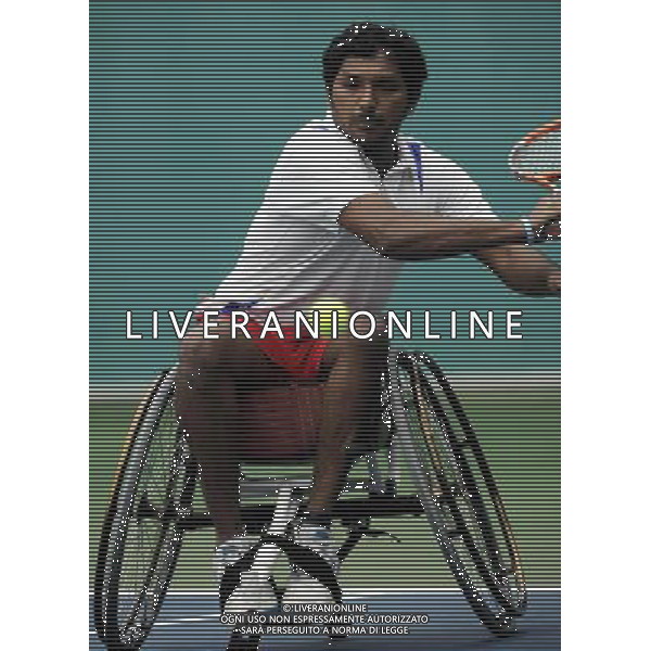 (101215) -- GUANGZHOU, Dec. 15, 2010 () -- India\'s Balachandar Subramanian returns to Iran\'s Mohammad Yaghoubi during the consolation quarterfinal of the men\'s singles open of wheelchair tennis competition at the Guangzhou 2010 Asian Para Games in Guangzhou, south China\'s Guangdong Province, Dec. 15, 2010. Balachandar Subramanian lost 0-2. (/Yue Yuewei) AG. ALDO LIVERANI SAS ITALY ONLY