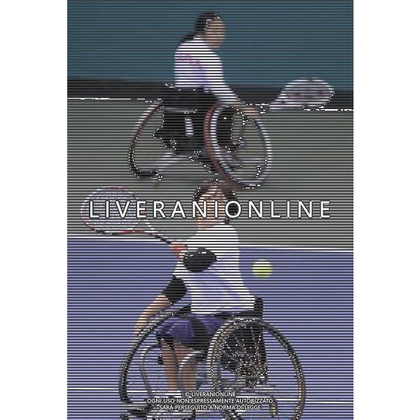 (101215) -- GUANGZHOU, Dec. 15, 2010 () -- Japan\'s Kanako Domori (front) and Yuko Okabe compete during the round robin of women\'s doubles of wheelchair tennis competition against Chinese Taipei\'s Lu Chia Yi and Wu Yi Shan at the Guangzhou 2010 Asian Para Games in Guangzhou, south China\'s Guangdong Province, Dec. 15, 2010. Kanako Domori and Yuko Okabe won 2-0. (/Yue Yuewei) AG. ALDO LIVERANI SAS ITALY ONLY