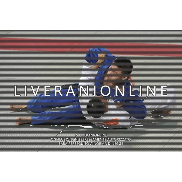 (101215) -- GUANGZHOU, Dec. 15, 2010 () -- China\'s Zhao Xu (above) competes during the bronze medal match of the men\'s 66kg judo competition at the Guangzhou 2010 Asian Para Games in Guangzhou, south China\'s Guangdong Province, Dec. 15, 2010. Zhao Xu won the bronze of the event. (/Han Chuanhao) AG. ALDO LIVERANI SAS ITALY ONLY