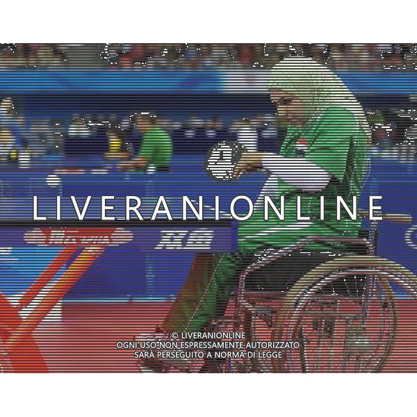 (101215) -- GUANGZHOU, Dec. 15, 2010 () -- Suhair Igazr of Iraq competes during the women\'s table tennis TT5 match against Zhang Bian of China at the Guangzhou 2010 Asian Para Games in Guangzhou, south China\'s Guangdong Province, Dec. 15, 2010. (/Xu Yu) AG. ALDO LIVERANI SAS ITALY ONLY