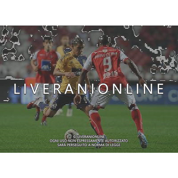 20101212: LISBON, PORTUGAL - SL Benfica vs SC Braga: Portuguese Cup 2010/2011. In picture: Maxi Pereira (Benfica) and Paulo Cesar (Braga). PHOTO: Alvaro Isidoro/CITYFILES/NEWSPIX.PL AG ALDO LIVERANI ONLY ITALY 