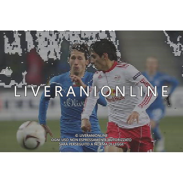 16.12.2012 SALZBURG AUSTRIA PILKA NOZNA , UEFA LIGA EUROPA , GRUPA A , SEZON 2010/2011 FC RED BULL SALZBURG - LECH POZNAN , CITY STADIUM , FOOTBALL , UEFA EUROPA LEGAUE , SEASON 2010/2011 , 2. ROUND , GAME BETWEEN FC RED BULL SALZBURG - LECH POZNAN N/Z: MARCIN KIKUT (L) FOTO JAKUB PIASECKI/CYFRASPORT / NEWSPIX.PL --- Newspix.pl AG. ALDO LIVERANI SAS ITALY ONLY *** Local Caption ***
