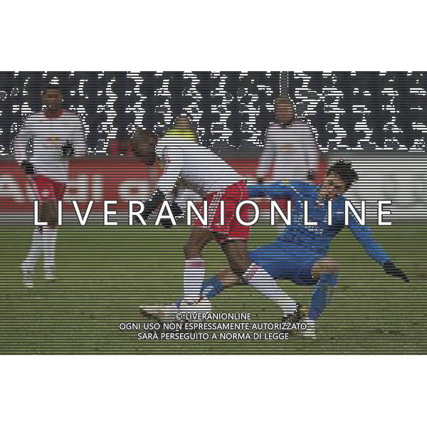 16.12.2010 SALZBURG AUSTRIA PILKA NOZNA , UEFA LIGA EUROPA , GRUPA A , SEZON 2010/2011 FC RED BULL SALZBURG - LECH POZNAN , CITY STADIUM , FOOTBALL , UEFA EUROPA LEGAUE , SEASON 2010/2011 , GAME BETWEEN FC RED BULL SALZBURG - LECH POZNAN N/Z: RABIU AFOLABI (L) MARCIN KIKUT (P) FOTO JAKUB PIASECKI/CYFRASPORT / NEWSPIX.PL --- Newspix.pl AG. ALDO LIVERANI SAS ITALY ONLY *** Local Caption ***