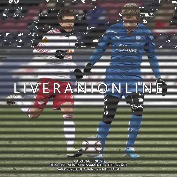 16.12.2010 SALZBURG AUSTRIA PILKA NOZNA , UEFA LIGA EUROPA , GRUPA A , SEZON 2010/2011 FC RED BULL SALZBURG - LECH POZNAN , CITY STADIUM , FOOTBALL , UEFA EUROPA LEGAUE , SEASON 2010/2011 , GAME BETWEEN FC RED BULL SALZBURG - LECH POZNAN N/Z:DANIEL OFFENBACHER (L) ARTJOMS RUDNEVS (P) FOTO JAKUB PIASECKI/CYFRASPORT / NEWSPIX.PL --- Newspix.pl AG. ALDO LIVERANI SAS ITALY ONLY *** Local Caption ***