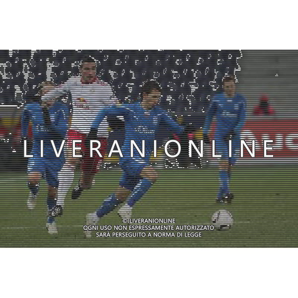 16.12.2010 SALZBURG AUSTRIA PILKA NOZNA , UEFA LIGA EUROPA , GRUPA A , SEZON 2010/2011 FC RED BULL SALZBURG - LECH POZNAN , CITY STADIUM , FOOTBALL , UEFA EUROPA LEGAUE , SEASON 2010/2011 , GAME BETWEEN FC RED BULL SALZBURG - LECH POZNAN N/Z: JOAQUIN BOGHOSSIAN L( MARCIN KIKUT (P) FOTO JAKUB PIASECKI/CYFRASPORT / NEWSPIX.PL --- Newspix.pl AG. ALDO LIVERANI SAS ITALY ONLY *** Local Caption ***
