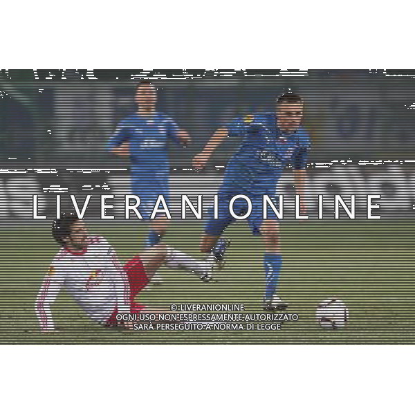 16.12.2010 SALZBURG AUSTRIA PILKA NOZNA , UEFA LIGA EUROPA , GRUPA A , SEZON 2010/2011 FC RED BULL SALZBURG - LECH POZNAN , CITY STADIUM , FOOTBALL , UEFA EUROPA LEGAUE , SEASON 2010/2011 , GAME BETWEEN FC RED BULL SALZBURG - LECH POZNAN N/Z: SIMON CZIOMMER (L) SLAWOMIR PESZKO (P) FOTO JAKUB PIASECKI/ CYFRASPORT / NEWSPIX.PL --- Newspix.pl AG. ALDO LIVERANI SAS ITALY ONLY *** Local Caption ***