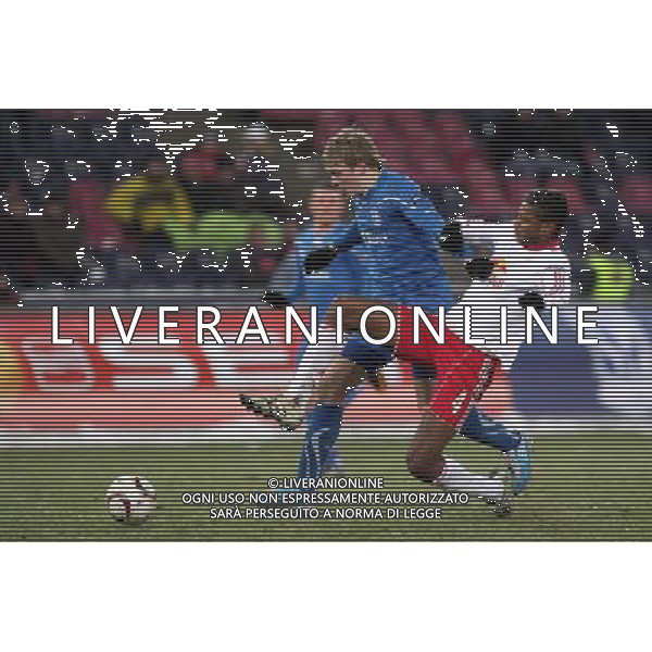 16.12.2010 SALZBURG AUSTRIA PILKA NOZNA , UEFA LIGA EUROPA , GRUPA A , SEZON 2010/2011 FC RED BULL SALZBURG - LECH POZNAN , CITY STADIUM , FOOTBALL , UEFA EUROPA LEGAUE , SEASON 2010/2011 , GAME BETWEEN FC RED BULL SALZBURG - LECH POZNAN N/Z: ARTJOMS RUDNEVS (L) DAVID MENDES DA SILVA (P) FOTO JAKUB PIASECKI/CYFRASPORT / NEWSPIX.PL --- Newspix.pl AG. ALDO LIVERANI SAS ITALY ONLY *** Local Caption ***