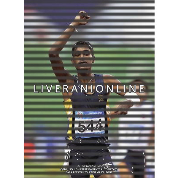 (101216) -- GUANGZHOU, Dec. 16, 2010 () -- Sri Lanka\'s Pradeep Uggl Denapathirannehelage celebrates after the men\'s 400m T46 final at the 2010 Asian Para Games in Guangzhou, capital city of south China\'s Guangdong Province, Dec. 16, 2010. Pradeep Uggl Denapathirannehelage took the gold medal with a time of 51.83 seconds. (/Chen Yehua) (zc) AG. ALDO LIVERANI SAS ITALY ONLY