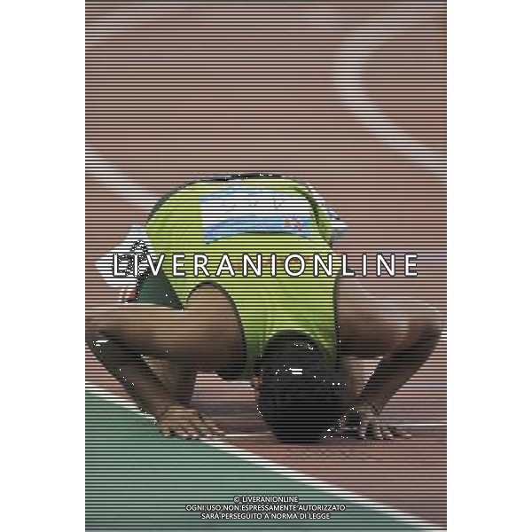 (101216) -- GUANGZHOU, Dec. 16, 2010 () -- Pakistan\'s Mudassar Baig kisses the track after the men\'s 400m T44 final at the 2010 Asian Para Games in Guangzhou, capital city of south China\'s Guangdong Province, Dec. 16, 2010. Mudassar Baig took the gold medal with a time of 59.58 seconds. (/Chen Yehua) (zc) AG. ALDO LIVERANI SAS ITALY ONLY