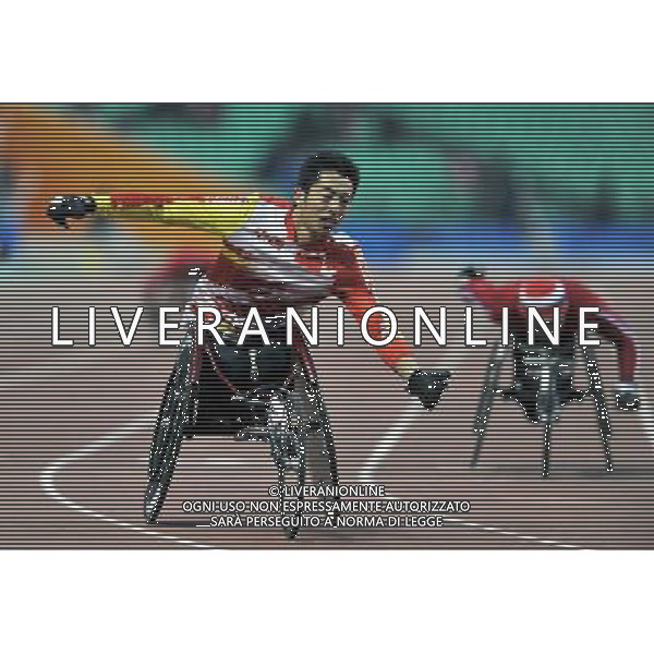 (101216) -- GUANGZHOU, Dec. 16, 2010 () -- China\'s Liu Chengming crosses the finishing line during the men\'s 400m T54 final at the 2010 Asian Para Games in Guangzhou, capital city of south China\'s Guangdong Province, Dec. 16, 2010. Liu took the gold medal with a time of 48.75 seconds. (/Chen Yehua) (zc) AG. ALDO LIVERANI SAS ITALY ONLY