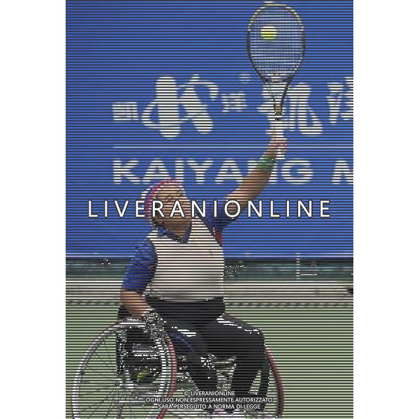 (101216) -- GUANGZHOU, Dec. 16, 2010 () -- Thailand\'s Sakhorn Khanthasit hits a shot to China\'s Huang Jinlian during the semifinal of the women\'s wheelchair tennis singles at the 2010 Asian Para Games in Guangzhou, capital city of south China\'s Guangdong Province, Dec. 16, 2010. Sakhorn Khanthasit won 2-0 and advanced into the final. (/Yue Yuewei) (zc) AG. ALDO LIVERANI SAS ITALY ONLY