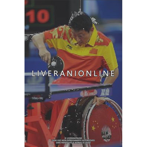 (101216) -- GUANGZHOU, Dec. 16, 2010 () -- China\'s Bai Gang returns the ball to Iran\'s Javad Fouladitarghi during the men\'s table tennis singles TT5 final at the 2010 Asian Para Games in Guangzhou, capital city of south China\'s Guangdong Province, Dec. 16, 2010. Bai Gang beat Javad Fouladitarghi in the final 3-1 and took the gold medal of the event. (/Xu Yu) (zc) AG. ALDO LIVERANI SAS ITALY ONLY