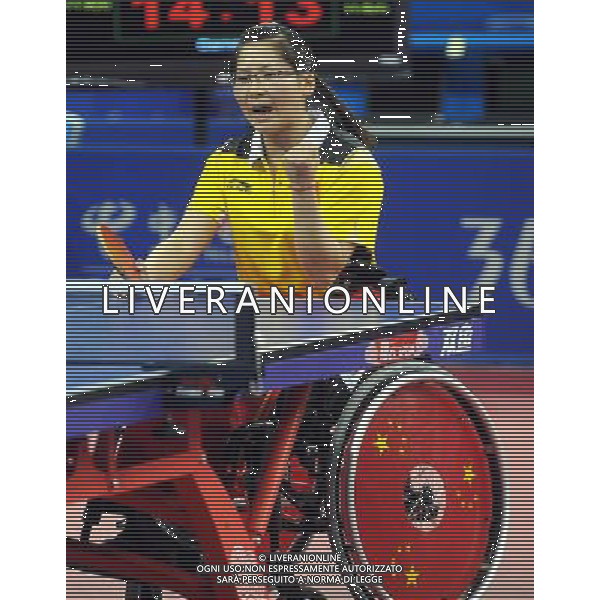 (101216) -- GUANGZHOU, Dec. 16, 2010 () -- China\'s Gu Gai celebrates scoring during the women\'s talbe tennis singles TT5 final against her compatriot Ren Guixiang at the 2010 Asian Para Games in Guangzhou, capital city of south China\'s Guangdong Province, Dec. 16, 2010. Gu Gai beat Ren Guixiang by 3-2 and took the gold medal of the event. (/Xu Yu) (zc) AG. ALDO LIVERANI SAS ITALY ONLY